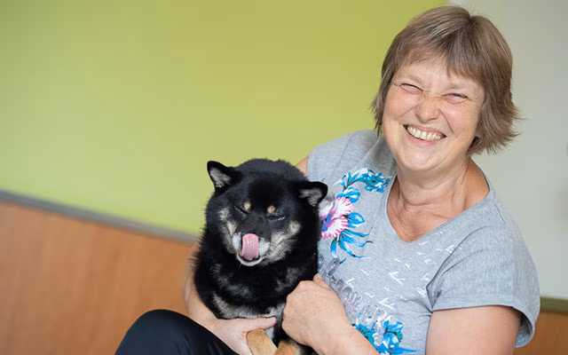 Reha-Patienten mit Hund